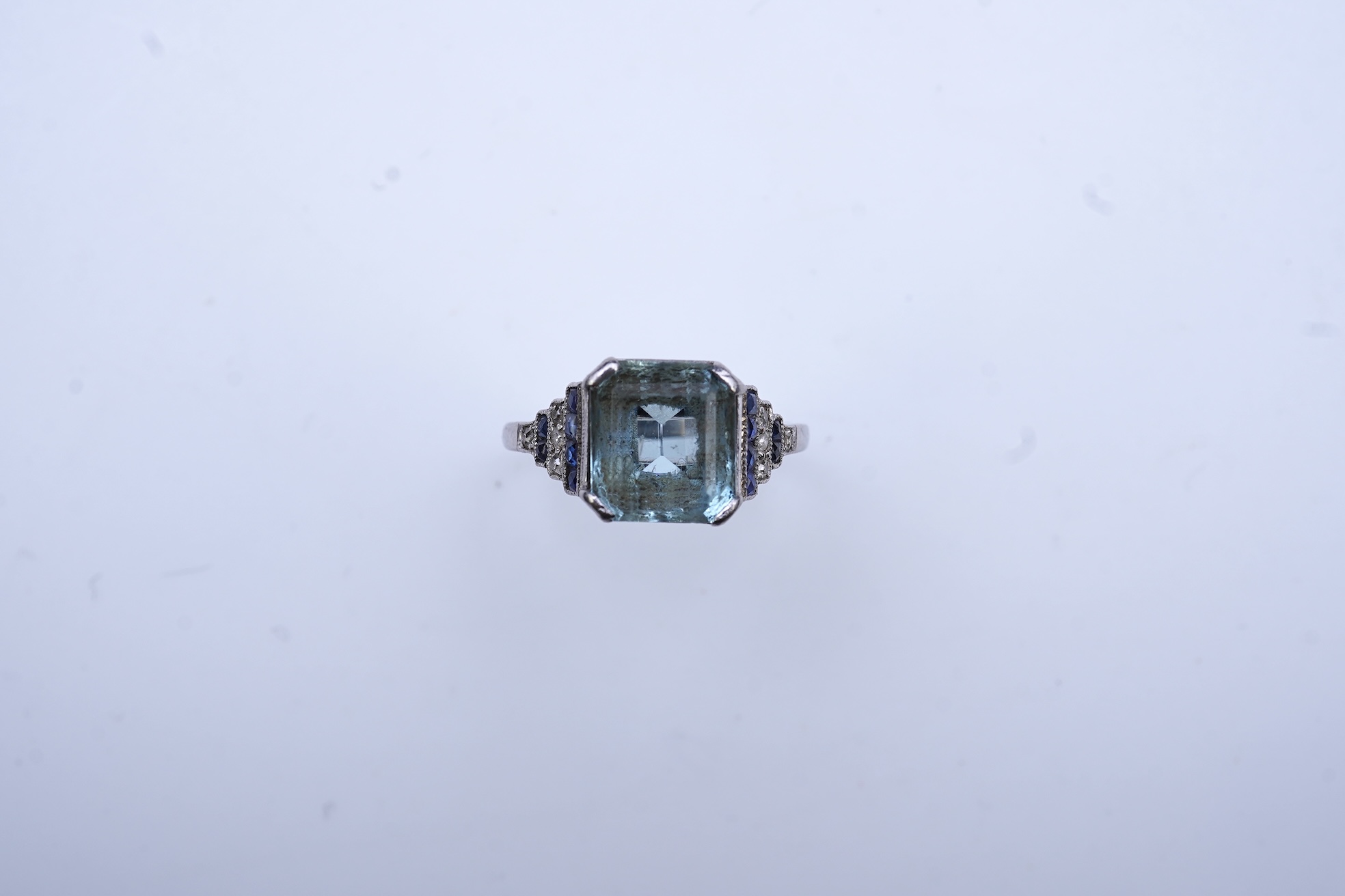 An aquamarine, sapphire and diamond ring